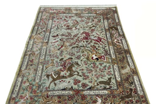 Surface texture of 2000s Ghom rug with natural Silk and intricate pattern
