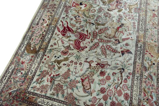 Backside of handmade 2000s Ghom rug showing knot structure and weave density