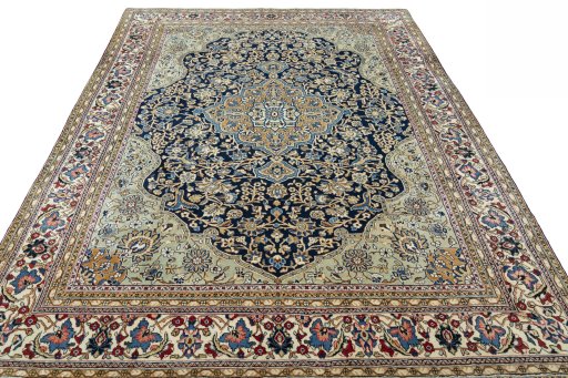 Surface texture of 1970s Ghom rug with natural Cork and intricate pattern