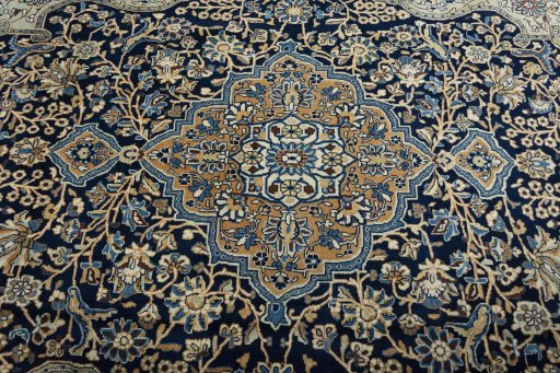 Central medallion detail of 1970s Ghom rug from Iran / Persia