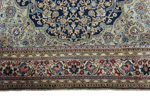Full view of 1970s Ghom rug from Iran / Persia, 325 × 225 cm in Blue tones