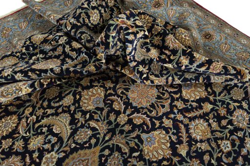 Surface texture of 1950s Ghom rug with natural Cork and intricate pattern