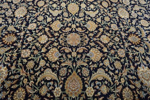 Central medallion detail of 1950s Ghom rug from Iran / Persia