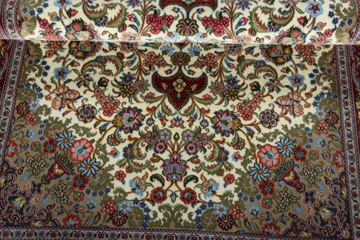 Close-up detail of 2000s Ghom rug from Iran / Persia showing Cork weave