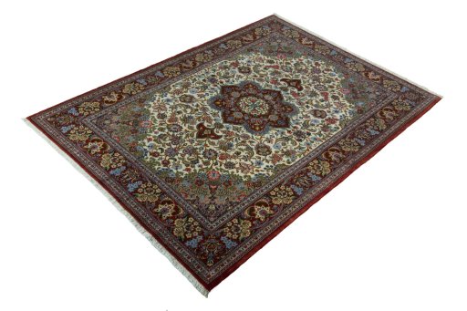 Corner detail of 2000s Ghom rug showing border pattern and Cork pile
