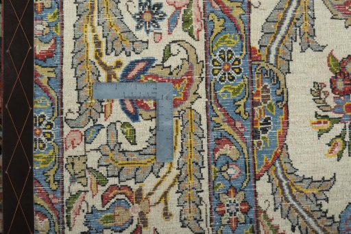 Close-up detail of 1950s Ghom rug from Iran / Persia showing Wool weave