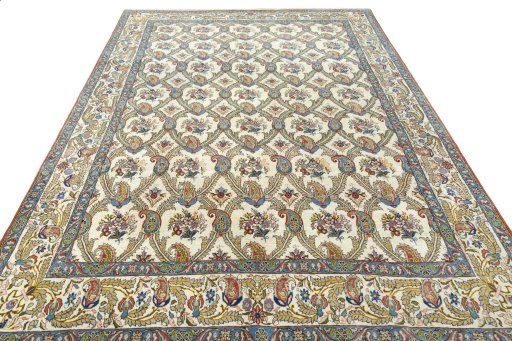 Surface texture of 1950s Ghom rug with natural Wool and intricate pattern