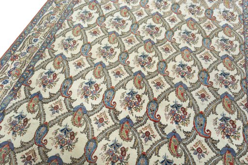 Backside of handmade 1950s Ghom rug showing knot structure and weave density
