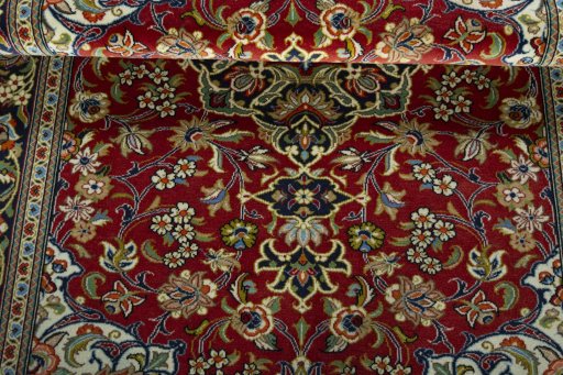 Close-up detail of 2000s Ghom rug from Iran / Persia showing Cork weave