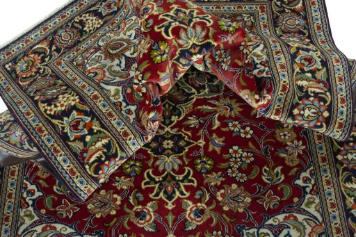 Surface texture of 2000s Ghom rug with natural Cork and intricate pattern