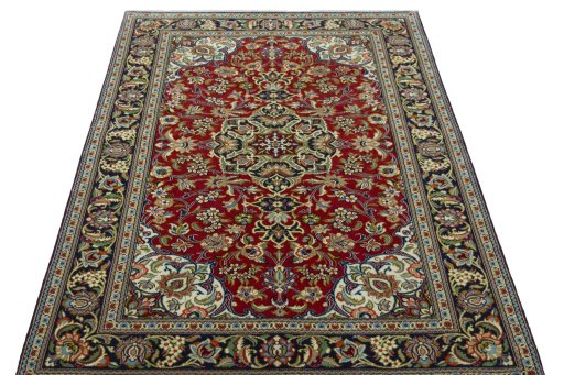 Surface texture of 2000s Ghom rug with natural Cork and intricate pattern