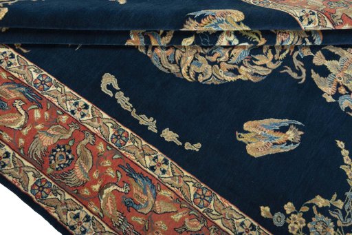 Close-up detail of 1970s Ghom rug from Iran / Persia showing Wool weave