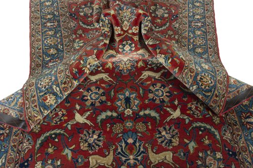 Surface texture of 1970s Ghom rug with natural Wool and intricate pattern