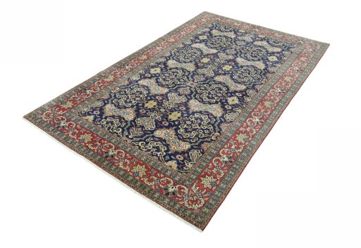 Corner detail of 1970s Ghom rug showing border pattern and Cork pile