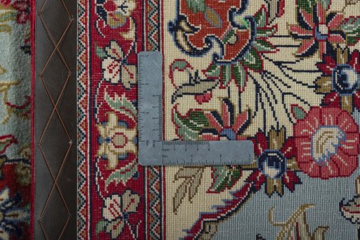 Backside of handmade New Ghom rug showing knot structure and weave density