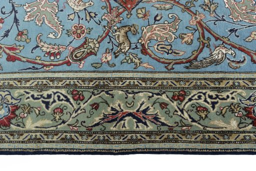 Corner detail of 1970s Ghom rug showing border pattern and Wool pile