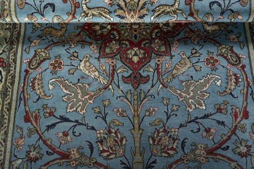 Close-up detail of 1970s Ghom rug from Iran / Persia showing Wool weave