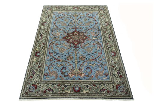 Surface texture of 1970s Ghom rug with natural Wool and intricate pattern