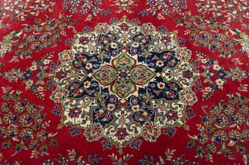Central medallion detail of New Ghom rug from Iran / Persia