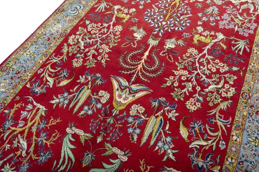 Backside of handmade 1970s Ghom rug showing knot structure and weave density