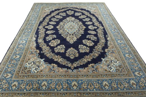 Surface texture of 2000s Ghom rug with natural Wool and intricate pattern