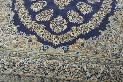 Close-up detail of 2000s Ghom rug from Iran / Persia showing Wool weave