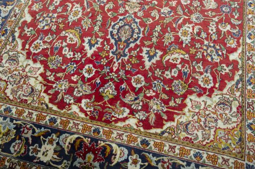 Close-up detail of 2000s Ghom rug from Iran / Persia showing Wool weave