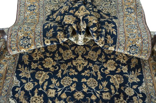 Surface texture of 1950s Ghom rug with natural Cork and intricate pattern