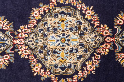 Full view of 2001s Ghom rug from Iran / Persia, 147 × 103 cm in Dark blue tones