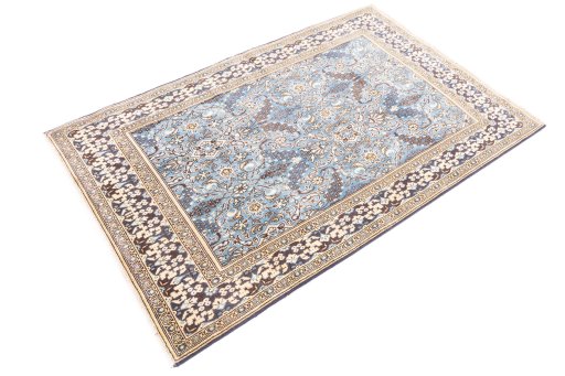 Corner detail of 1999s Ghom rug showing border pattern and Wool pile