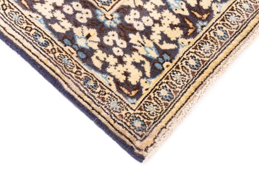 Central medallion detail of 1999s Ghom rug from Iran / Persia