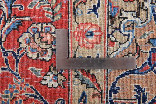 Corner detail of 1980s Ghom rug showing border pattern and Wool pile