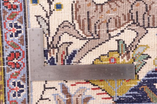 Close-up detail of 2000s Ghom rug from Iran / Persia showing Wool weave