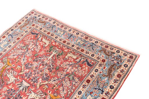 Surface texture of 1975s Ghom rug with natural Wool and intricate pattern