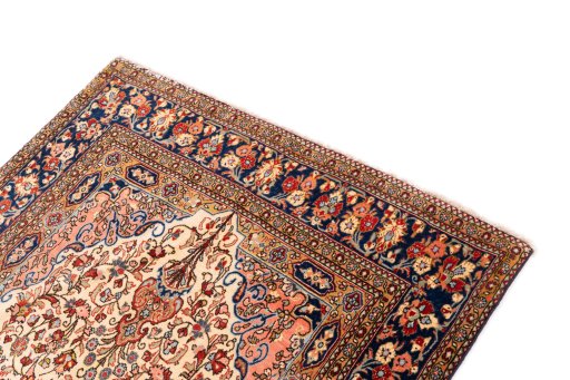 Surface texture of 1972s Ghom rug with natural Wool and intricate pattern