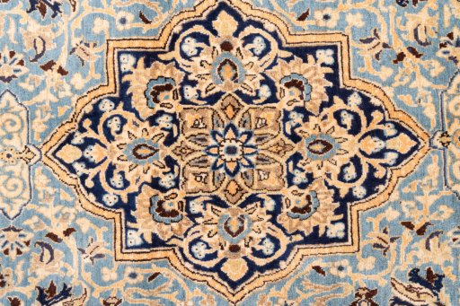 Corner detail of 1975s Ghom rug showing border pattern and Wool pile