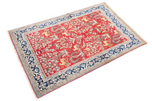 Corner detail of 1985s Ghom rug showing border pattern and Wool pile