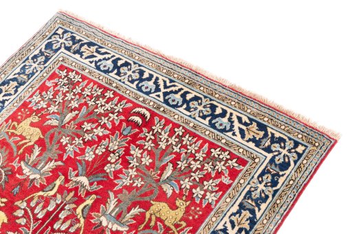 Surface texture of 1985s Ghom rug with natural Wool and intricate pattern