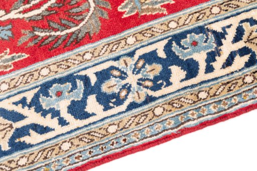 Backside of handmade 1985s Ghom rug showing knot structure and weave density