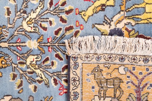 Close-up detail of 1988s Ghom rug from Iran / Persia showing Wool weave