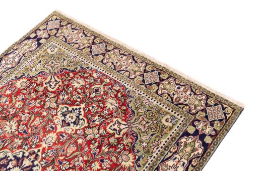 Surface texture of 1979s Ghom rug with natural Wool and intricate pattern