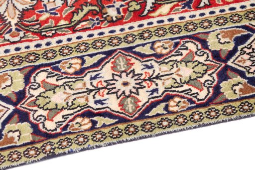 Backside of handmade 1979s Ghom rug showing knot structure and weave density