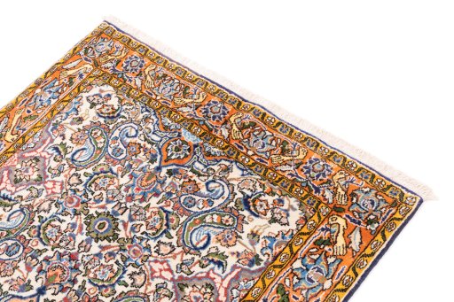 Surface texture of 1998s Ghom rug with natural Wool and intricate pattern