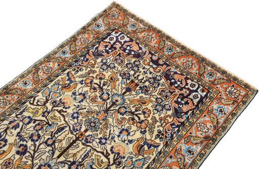 Surface texture of 1990s Ghom rug with natural Wool and intricate pattern