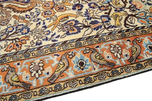 Backside of handmade 1990s Ghom rug showing knot structure and weave density