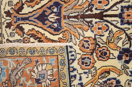 Close-up detail of 1990s Ghom rug from Iran / Persia showing Wool weave