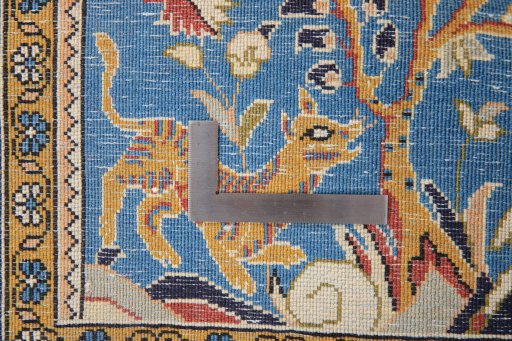 Close-up detail of 1990s Ghom rug from Iran / Persia showing Wool weave