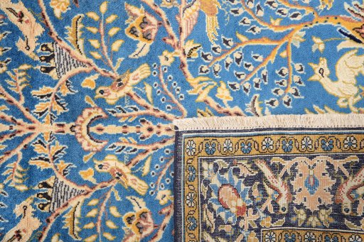 Close-up detail of 1990s Ghom rug from Iran / Persia showing Wool weave