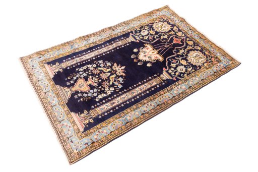 Close-up detail of 1995s Ghom rug from Iran / Persia showing Wool weave