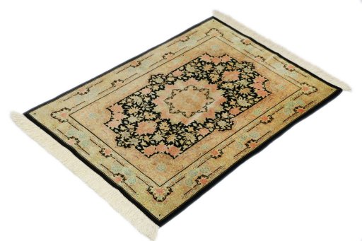 Corner detail of New Ghom rug showing border pattern and Silk pile